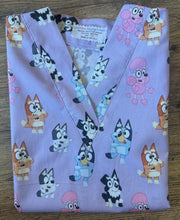 Load image into Gallery viewer, BLUEY Cartoon Inspired Playful Bluey and Friends purple Medical Scrub Top Unisex Style for Men & Women