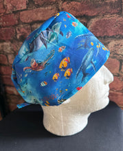 Load image into Gallery viewer, Nautical Tropical Fish Dolphins Reef Unisex Medical Surgical Scrub Caps Men & Women Tie Back and Bouffant Hat Styles