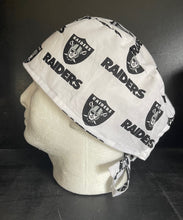 Load image into Gallery viewer, RAIDERS WHITE FOOTBALL Unisex Medical Surgical Scrub Caps Men & Women Tie Back and Bouffant Hat Styles