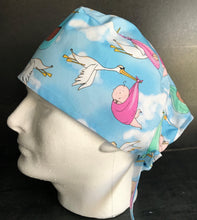 Load image into Gallery viewer, Special Delivery Stork Delivering Babies Nursery Fabric Unisex Medical Surgical Scrub Caps Men & Women Tie Back and Bouffant Hat Styles
