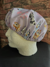 Load image into Gallery viewer, BLUEY &amp; BINGO CARTOON CHARACTERS DANCING FUN PURPLE Medical Scrub Caps Unisex Men &amp; Women Tie Back and Bouffant Hat Styles
