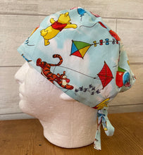 Load image into Gallery viewer, Winnie the Pooh Characters Flying Kites &amp; Balloons Fabric Unisex Medical Surgical Scrub Caps Men &amp; Women Tie Back and Bouffant Hat Styles
