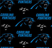 Load image into Gallery viewer, Solid Black Scrub Top with Featured Football Fabric on *Neck Band &amp; Pocket Options* Medical Scrub Top Unisex Style Shirt for Men &amp; Women
