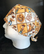 Load image into Gallery viewer, Toy Story Sherriff Woody Let's Ride Fabric Nurse Unisex Medical Surgical Scrub Caps Men &amp; Women Tie Back and Bouffant Hat Styles
