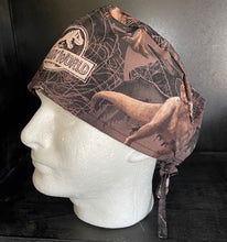 Load image into Gallery viewer, Jurassic World Movie Prehistoric Dinosaurs Brown Fabric Unisex Medical Surgical Scrub Caps Men &amp; Women Tie Back and Bouffant Hat Styles
