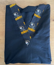 Load image into Gallery viewer, Solid Black Scrub Top with Steelers Football Fabric on *Neck Band &amp; Pocket Options* Relaxed Style Unisex Mens Scrub Top Womens Scrub Top
