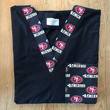 Load image into Gallery viewer, Solid Black Scrub Top with SF 49ers Football Fabric on *Neck Band &amp; Pocket Options* Relaxed Style Unisex Mens Scrub Top Womens Scrub Top
